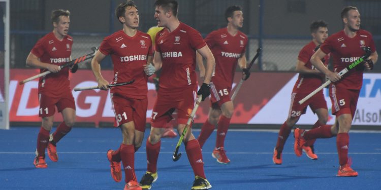 England players celebrate after scoring against Ireland at Kalinga Stadium, Friday