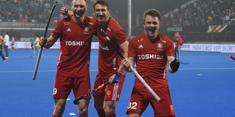 English players celebrate after their victory against New Zealand at Kalinga Stadium, Monday 