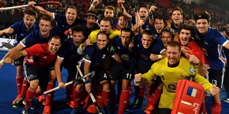 France players pose for a group photograph after their victory over Argentina at Kalinga Stadium, Thursday 