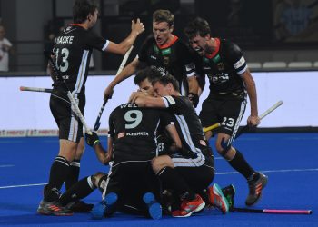 Germany players celebrate after scoring against the Netherlands at the Kalinga Stadium, Wednesday