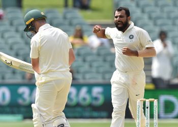 Mohammed Shami (R) celebrates dismissing Marcus Harris (L) at the Adelaide Oval