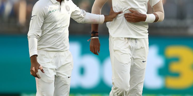 Ishant Sharma reacts after taking an Australian wicket as Ajinkya Rahane congratulates him at Perth, Friday