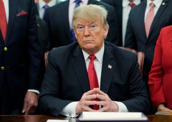 U.S. President Donald Trump listens to questions from reporters about an impending U.S. Government shutdown as he participates in a bill signing ceremony for the “First Step Act” and the “Juvenile Justice Reform Act” in the Oval Office of the White House in Washington, U.S., December 21, 2018.   (REUTERS/Joshua Roberts)