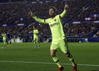 Lionel Messi wheels away in celebration after scoring against Levante, Sunday