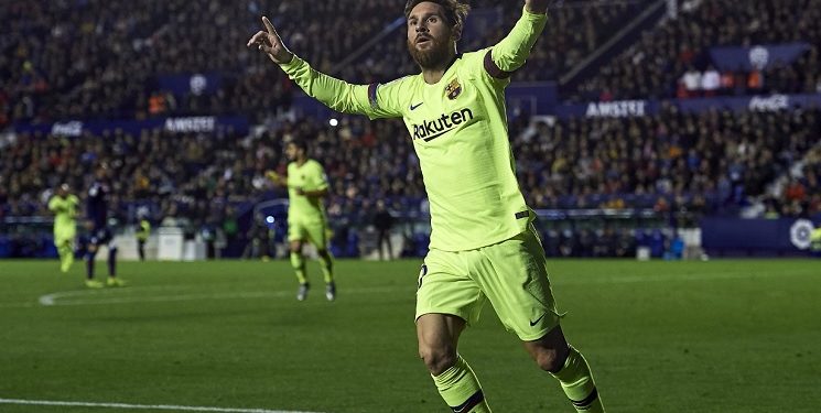 Lionel Messi wheels away in celebration after scoring against Levante, Sunday