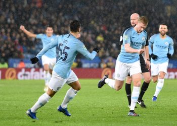 Kevin de Bruyne (R) wheels away in celebration after putting Man City ahead against Leicester City, Tuesday