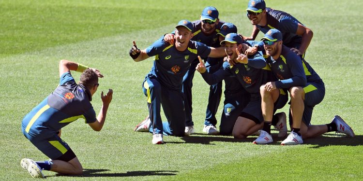 Australian players look in good spirits ahead of Melbourne Test as they share a light moment during the team’s training session, Monday
