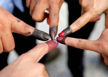 Voters after marking their election.