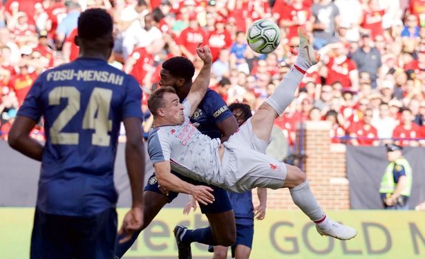 Xherdan Shaqiri scores his first goal for Liverpool through a bicycle kick 