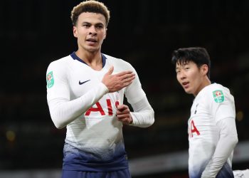 Dele Alli (L) celebrates his goal against Arsenal as other Tottenham goal scorer Son Heung-min looks on