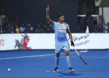 Harmanpreet Singh celebrates after scoring India's second goal against Belgium at the Kalinga Stadium, Sunday