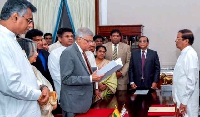 Sri Lanka's Prime Minister Ranil Wickremesinghe addresses his supporters and the party members after assuming duties in Colombo, Sri Lanka December 16, 2018. (REUTERS)