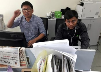 Reuters journalists Wa Lone (L) and Kyaw Soe Oo pose for a picture at the Reuters office in Yangon, Myanmar December 11, 2017. REUTERS