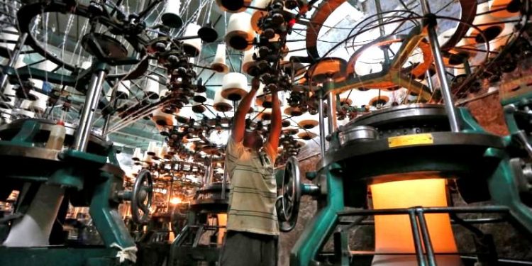 File Photo - An employee works inside an undergarment factory in Kolkata, (REUTERS)