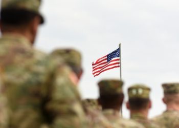 American Soldiers and US Flag. US troops