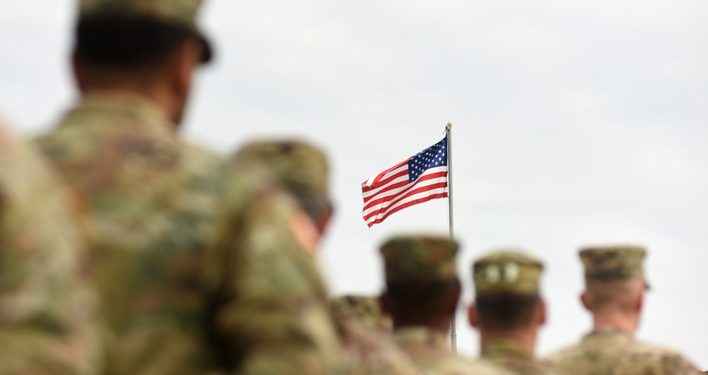 American Soldiers and US Flag. US troops