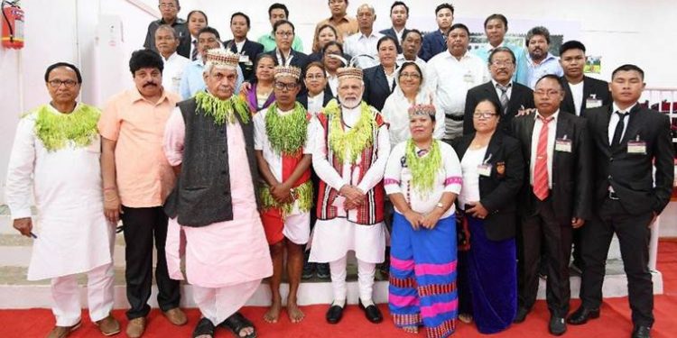 Prime Minister Narendra Modi interacts with the locals of Car Nicobar on Sunday. (TWITTER)