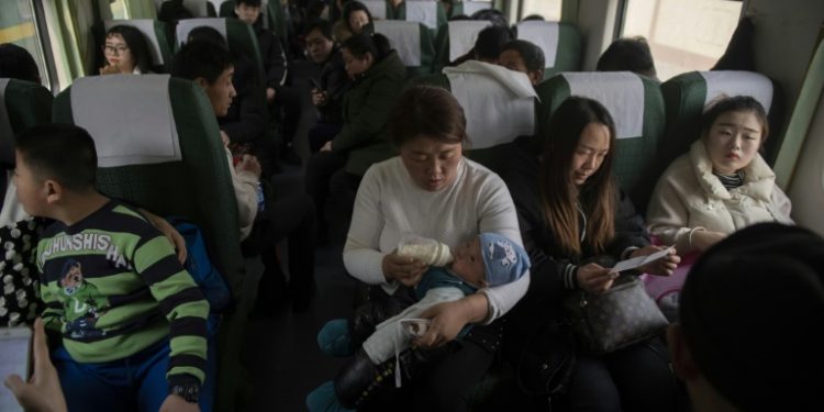 The most important holiday in the Chinese calendar places great emphasis on family reunions, and travellers must get home by Monday to usher in the Year of the Pig the following day (AFP)