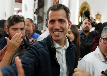 Opposition leader Juan Guaidó who declared himself President of Venezuela arrives to attend a Holy mass in Caracas (REUTERS)