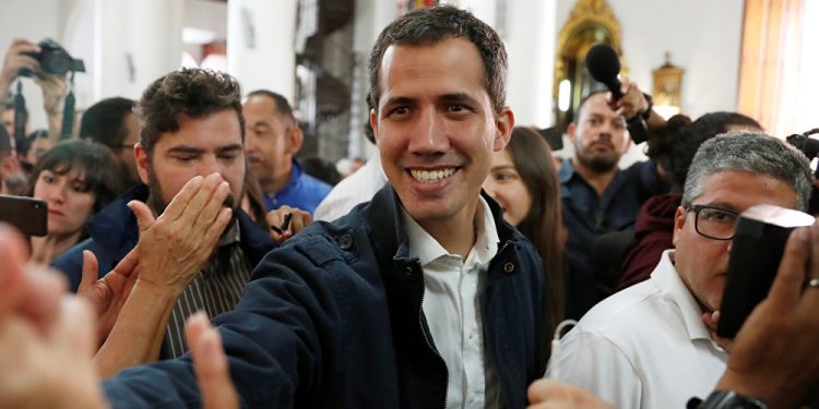 Opposition leader Juan Guaidó who declared himself President of Venezuela arrives to attend a Holy mass in Caracas (REUTERS)