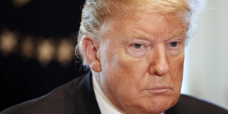 President Donald Trump attends a roundtable discussion on border security with local leaders, Friday Jan. 11, 2019, in the Cabinet Room of the White House in Washington. (AP)