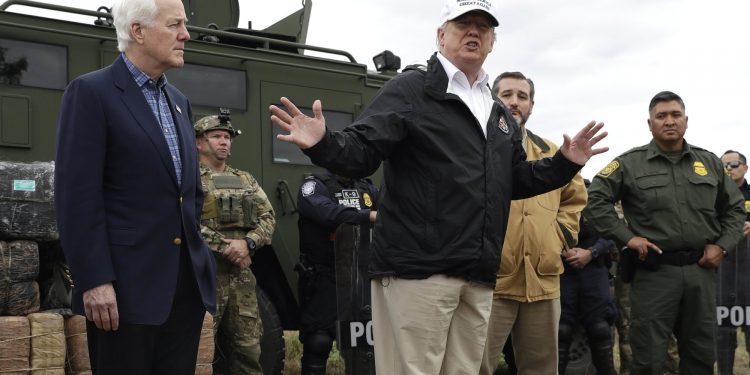 President Donald Trump speaks as tours the U.S. border with Mexico at the Rio Grande on the southern border, Thursday, Jan. 10, 2019, in McAllen, Texas, as Sen. John Cornyn, R-Texas, left, and Sen. Ted Cruz, R-Texas, listen. (AP)