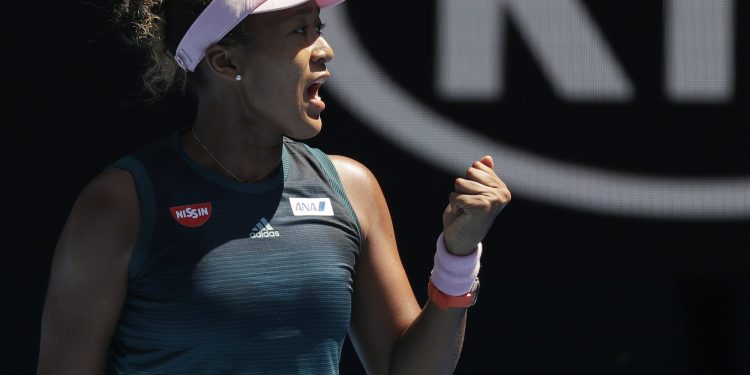Japan's Naomi Osaka reacts after winning the first set against Ukraine's Elina Svitolina during their quarterfinal match at the Australian Open tennis championships in Melbourne, Australia, Wednesday, Jan. 23, 2019. (AP)