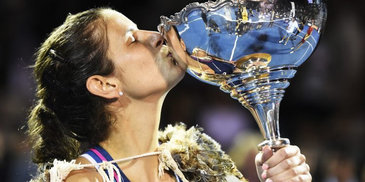 Julia Goerges kisses the trophy after winning against Bianca Andreescu in the final in Auckland, Sunday