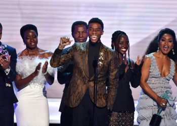 Chadwick Boseman (C) accepts the top SAG Award for "Black Panther" flanked by his castmates including Michael B. Jordan (L), Danai Gurira (C), Lupita Nyong'o (2R) and Angela Bassett (R) (AFP)