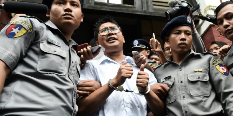 Reporters Wa Lone, pictured, and Kyaw Soe Oo, were arrested in Yangon in December 2017 and later sentenced to seven years in jail for violating the state secrets act, a charge supporters say is trumped up (AFP)