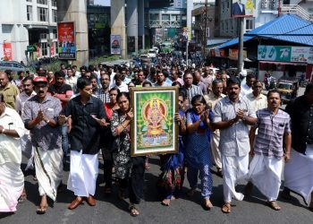 Protests broke out after police escorted two women into a controversial temple in Southern India (AFP)