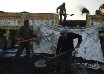 The burning of coal contributes to the smog, which reduces visibility and makes breathing difficult