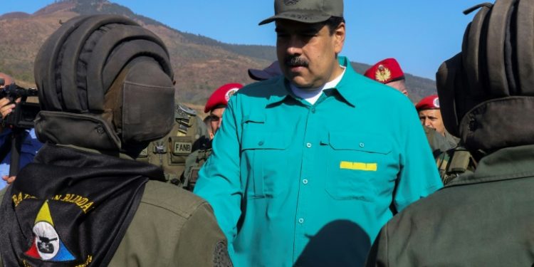 Most of the Lima Group has urged Venezuela's President Nicolas Maduro, pictured during military exercises on January 27, 2019, to step down (AFP)