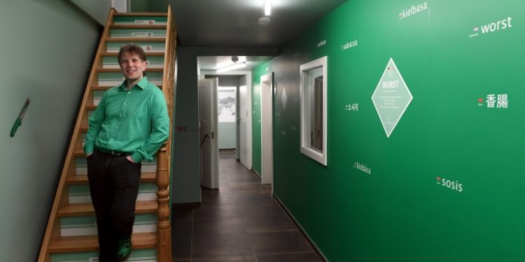 Claus Boebel, 48, also delivers his wares in his bright green "Wurst taxi" to villagers