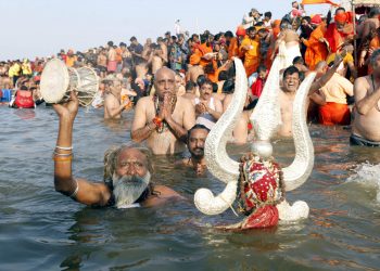 PRAYAGRAJ (ALLAHABAD) JAN 15 (UNI)- Naga Sadhus taking Holy dip at Sangam during the 1st Shahi Snan (Royal Bath) of the Kumbh -2019 on the occasion of Makar Sankrinti in Prayagraj on Tuesday. UNI PHOTO-37u