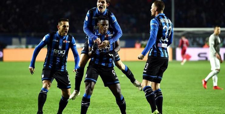 Atalanta players celebrate after their win over Juventus