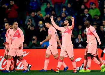 Lionel Messi gestures towards sky after scoring Barcelona’s opener against Getafe in Madrid, Sunday