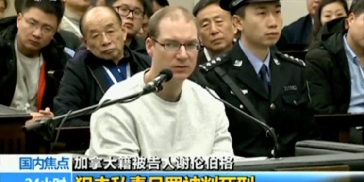 A still image taken from CCTV video shows Canadian Robert Lloyd Schellenberg in court, where he was sentenced with a death penalty for drug smuggling, in Dalian, Liaoning province, China