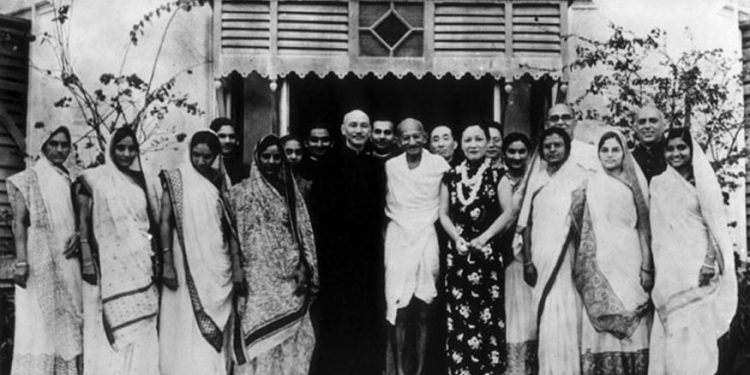 Premier of the Republic of China Chiang Kai-shek with his wife, Soong May-ling, stand either side of Mahatma Gandhi after a meeting between Chiang Kai-shek and Gandhi to discuss matters of common concern to both India and China, in India. (AFP/Getty Images)