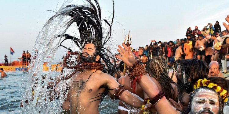 File pic. Naga Sadhus take dip at the Maha Kumbh (AP)