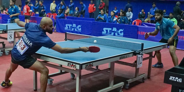 Odisha’s Asif Haque (L) in action during his match against Sourav Saha of Haryana at Cuttack, Friday 