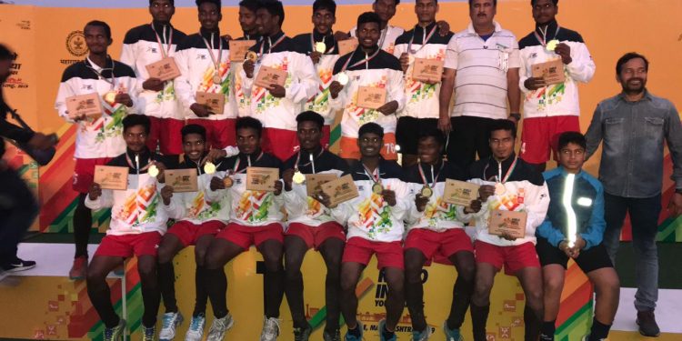 Odisha U-21 hockey team players pose with the trophies and medals in Mumbai, Tuesday