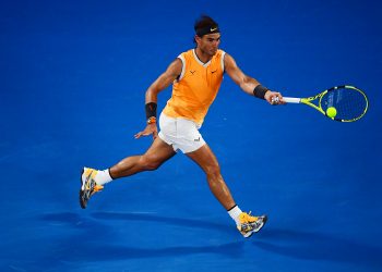 Rafa Nadal returns a shot to Stefanos Tsitsipas (not in pic) during their Australian Open semifinal encounter at the Rod Laver Arena, Thursday 