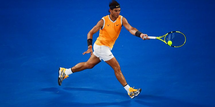 Rafa Nadal returns a shot to Stefanos Tsitsipas (not in pic) during their Australian Open semifinal encounter at the Rod Laver Arena, Thursday 