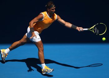 MELBOURNE, AUSTRALIA - JANUARY 14:  Rafael Nadal of Spain plays a forehand in his first round match against James Duckworth of Australia during day one of the 2019 Australian Open at Melbourne Park on January 14, 2019 in Melbourne, Australia.  (Photo by Julian Finney/Getty Images)