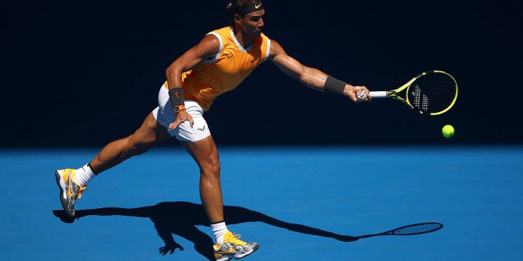 MELBOURNE, AUSTRALIA - JANUARY 14:  Rafael Nadal of Spain plays a forehand in his first round match against James Duckworth of Australia during day one of the 2019 Australian Open at Melbourne Park on January 14, 2019 in Melbourne, Australia.  (Photo by Julian Finney/Getty Images)