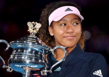 Tennis - Australian Open - Women's Singles Final - Melbourne Park, Melbourne, Australia, January 26, 2019. Japan's Naomi Osaka poses with the trophy after winning her match against Czech Republic's Petra Kvitova. REUTERS/Lucy Nicholson - UP1EF1Q0WDCK2