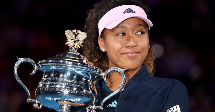 Tennis - Australian Open - Women's Singles Final - Melbourne Park, Melbourne, Australia, January 26, 2019. Japan's Naomi Osaka poses with the trophy after winning her match against Czech Republic's Petra Kvitova. REUTERS/Lucy Nicholson - UP1EF1Q0WDCK2