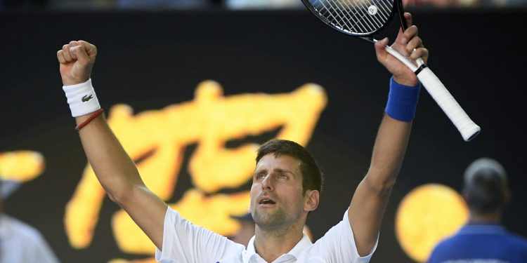 Novak Djokovic celebrates after defeating Denis Shapovalov at the Rod Laver Arena in Melbourne, Saturday                  
