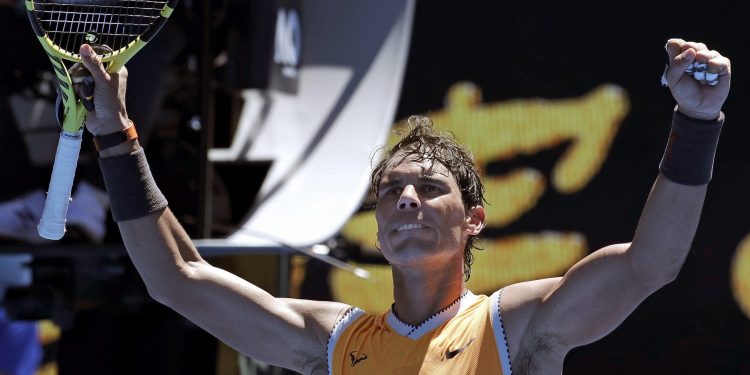 Rafa Nadal celebrates after his first round win at the Australian Open tennis tournament at Melbourne, Monday
